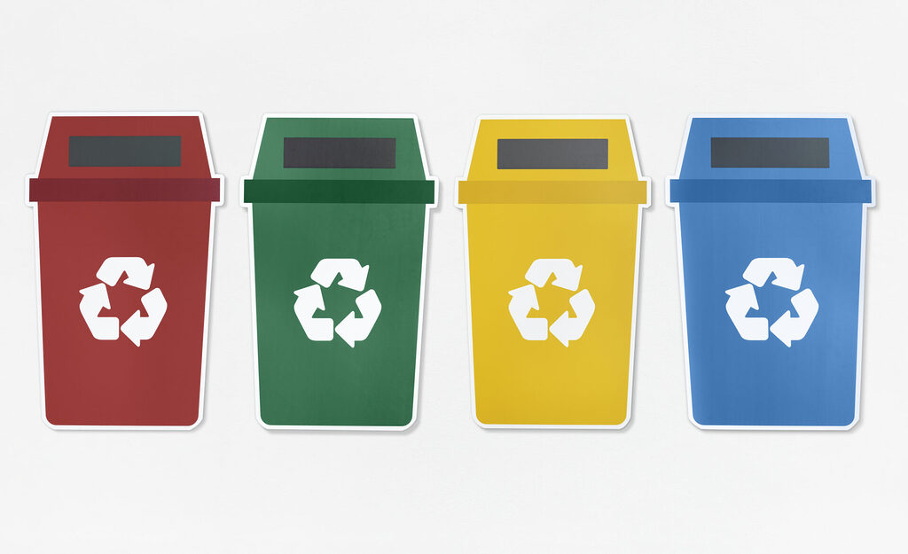 set of trash bins with recycle symbol